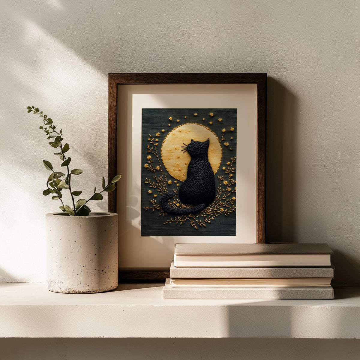 Embroidered Moon Cat Halloween art print shown in a room setting